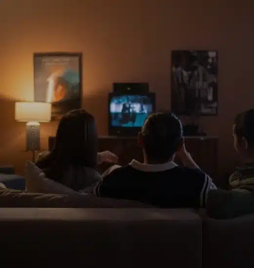 Person watching IPTV at home on Watch TV Direct